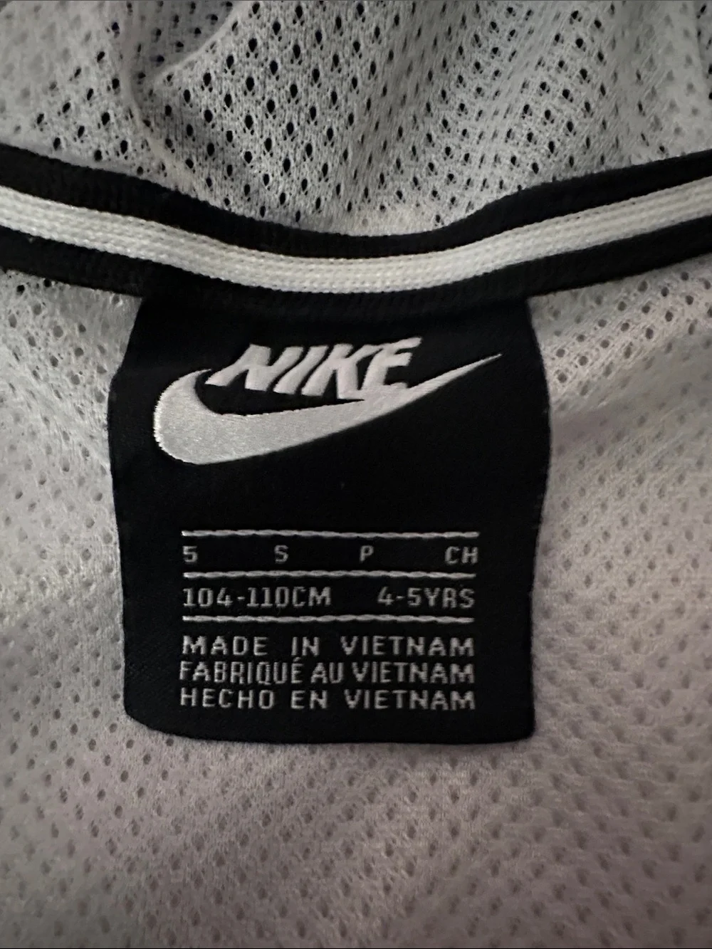 Nike white, black, and gray wind breaker  boys size 5